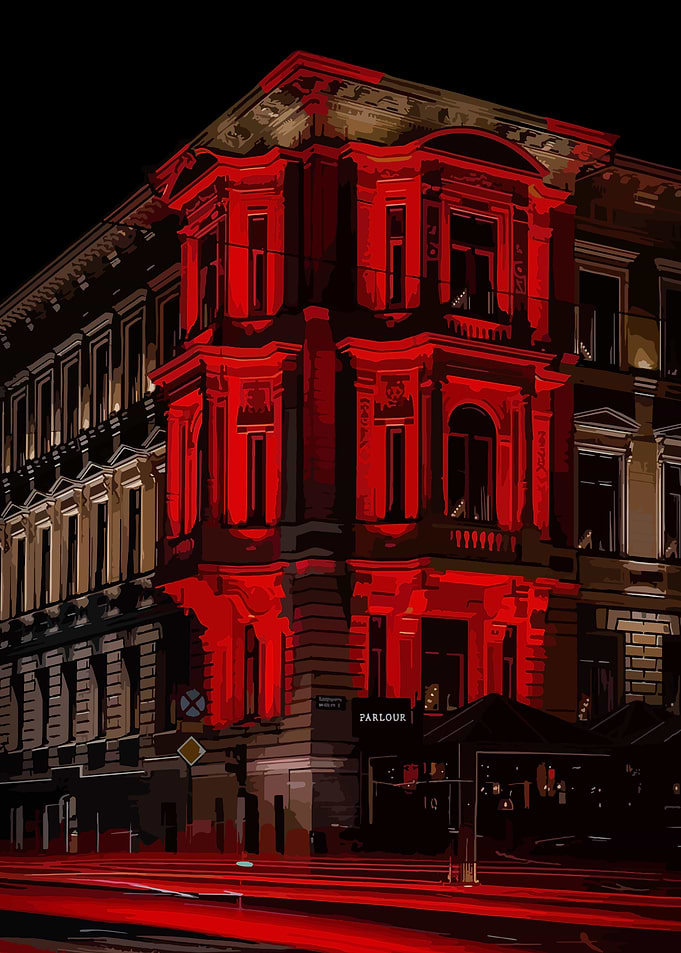 Building illuminated by red light at night