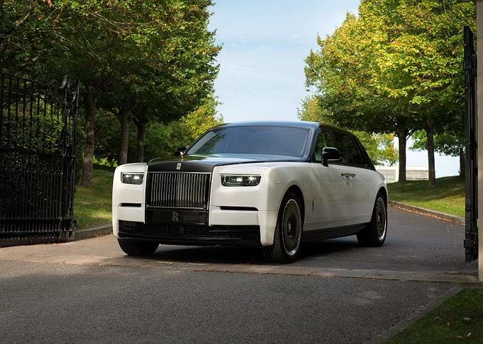 Rolls-Royce Phantom driving through gates
