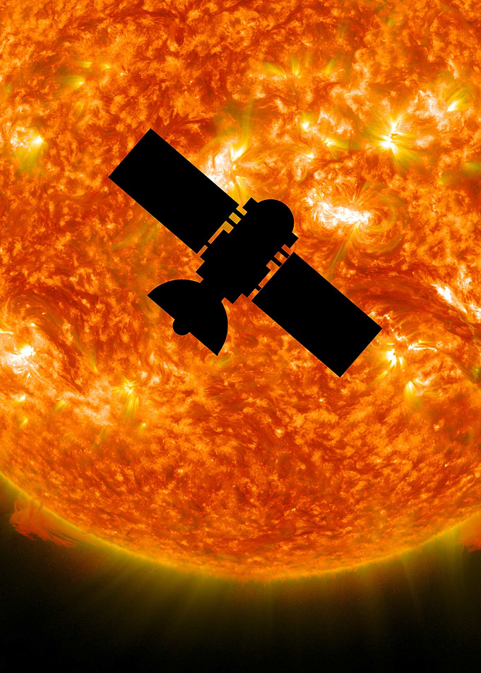 Satellite in front of the Sun