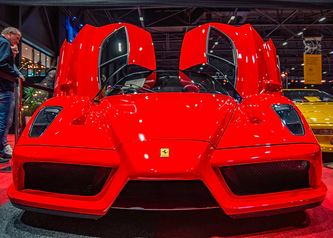 Red Ferrari Enzo with Doors Open