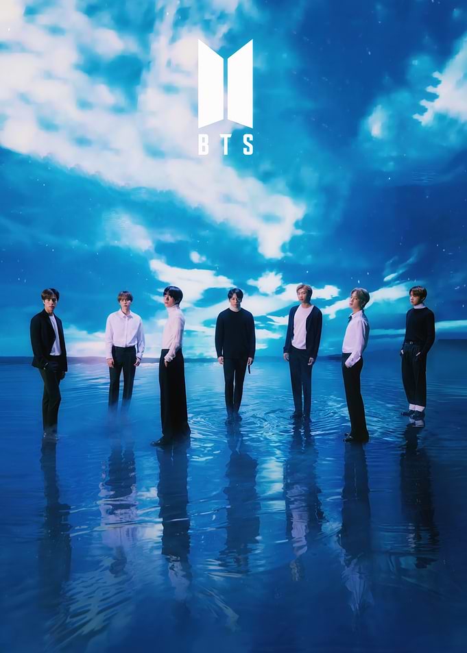 BTS members standing in water