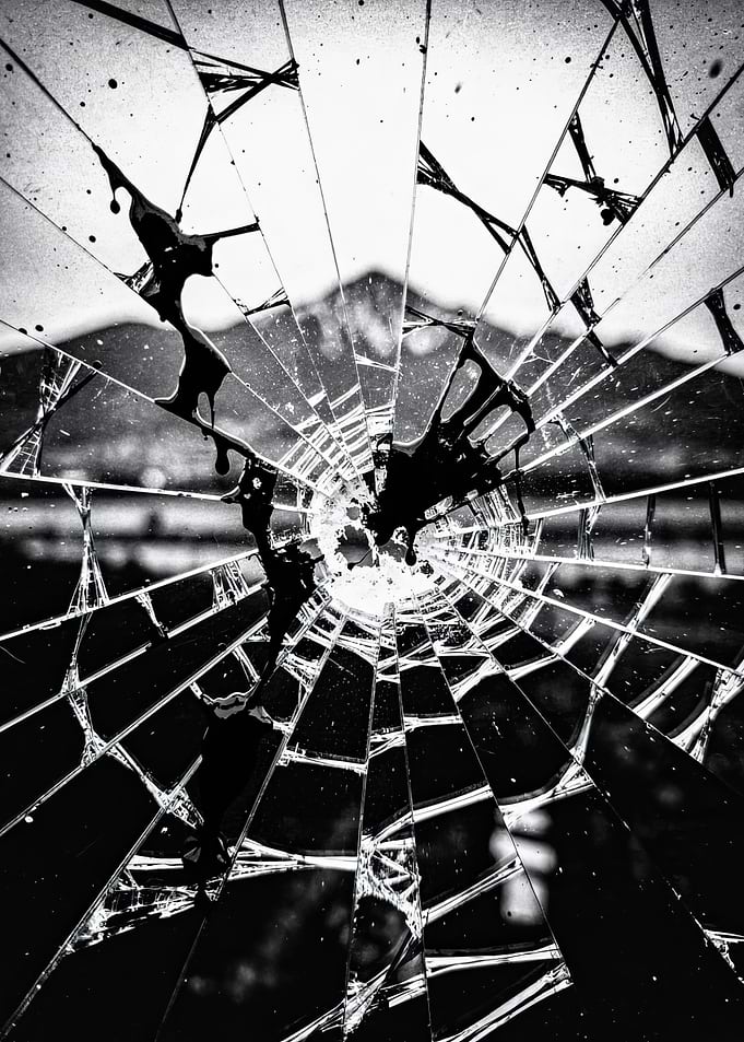Shattered Mirror with Dark Splatters