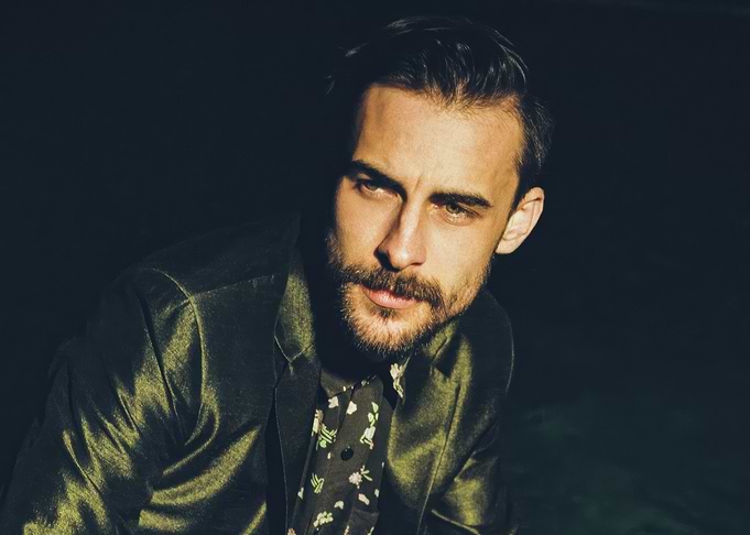 robert ellis in a shiny green jacket