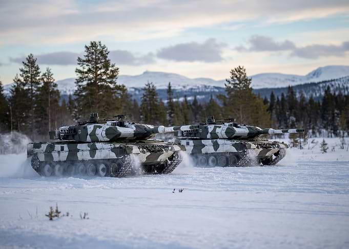 Tanks in a Snowy Landscape