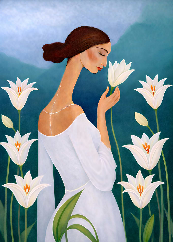 Woman smelling lilies in a garden
