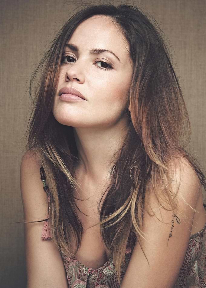 natalia doco with long brown hair and tattoo
