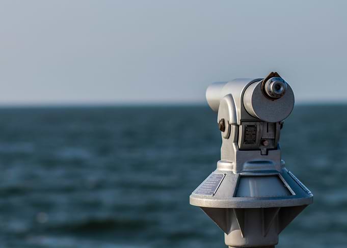Coin-Operated Binoculars Overlooking the Ocean