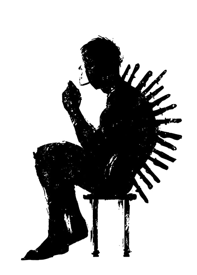 Man with Knives in Back Smoking