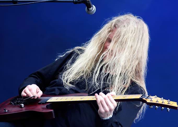 jeff loomis Guitarist with long blonde hair