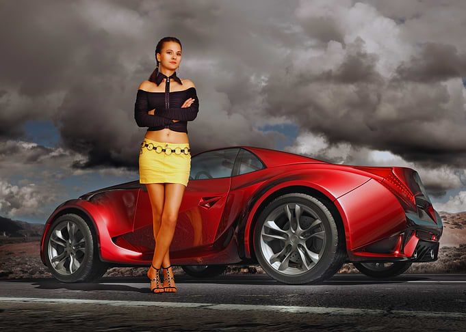 Woman Posing with Red Sports Car