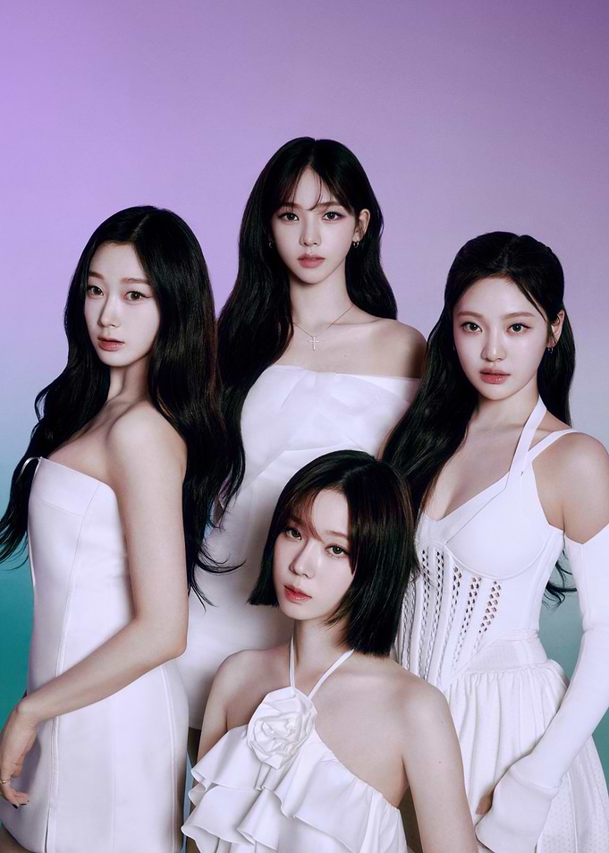 Four K-Pop Idols in White Outfits aespa