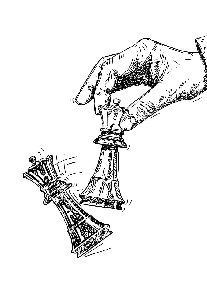 Hand knocking over chess queen