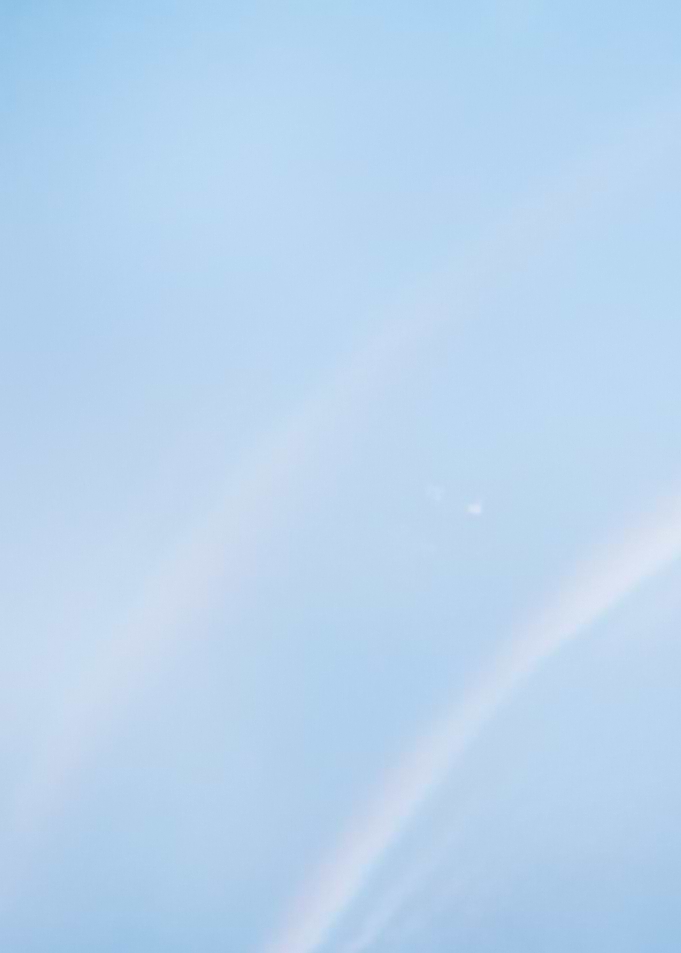 Soft Blue Sky with Wispy Clouds