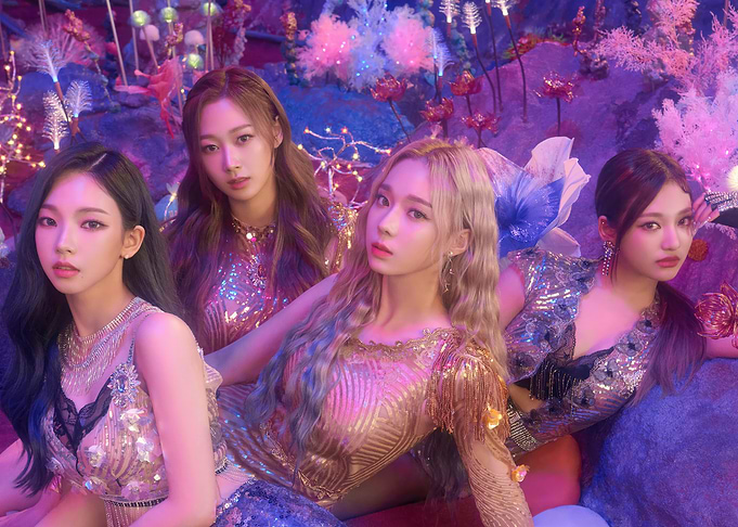 aespa K-pop girl group in sparkly outfits