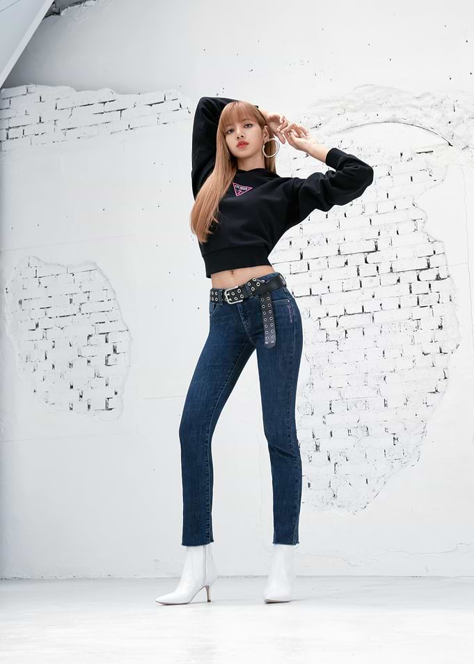 Lisa in black crop top and jeans
