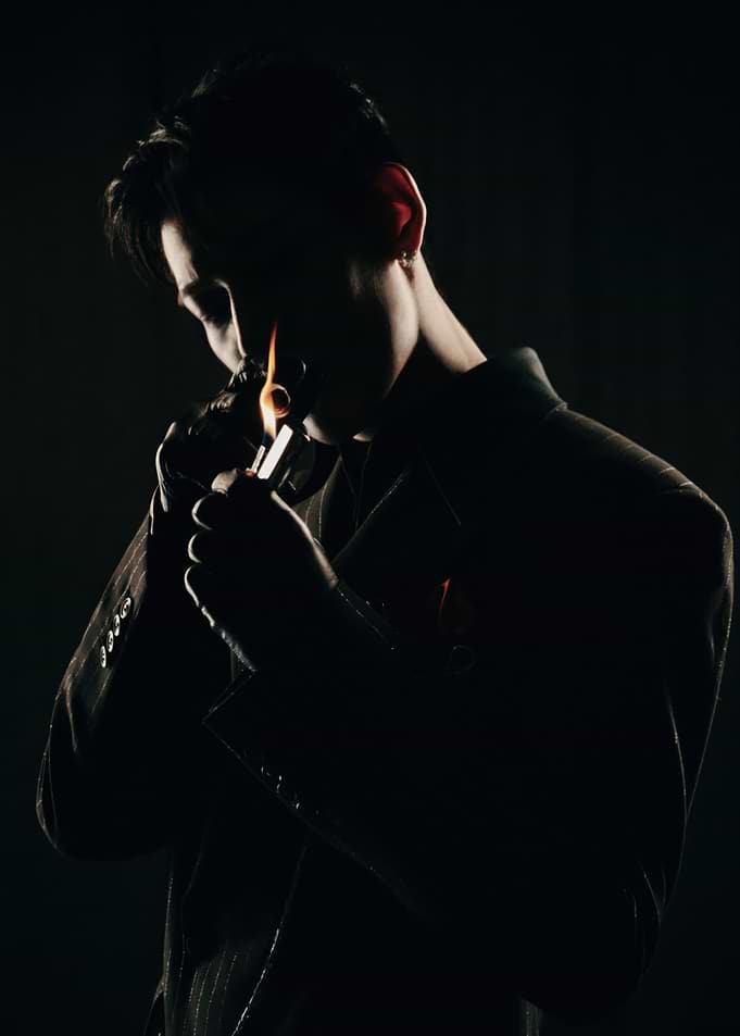 bambam lighting a cigarette