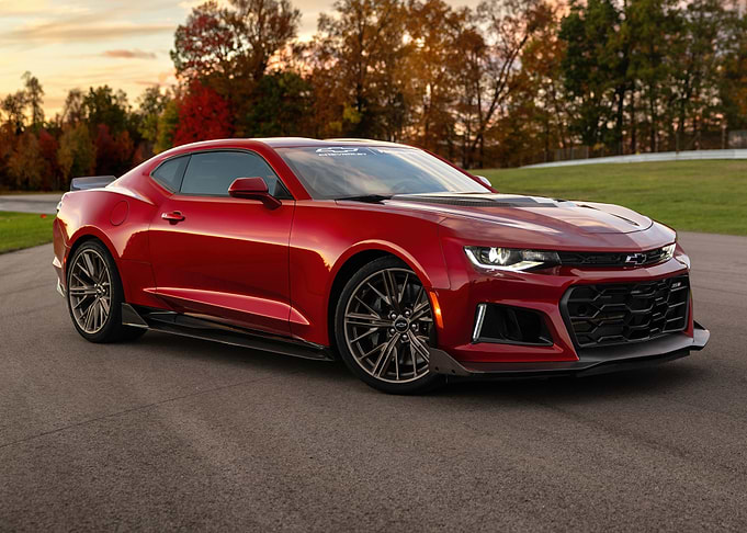 Red Chevrolet Camaro ZL1 on a Racetrack