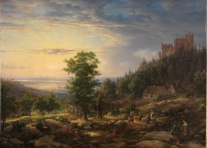 Castle Ruins Overlooking a Valley at Sunset