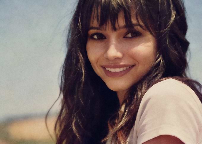 Young Woman Smiling Outdoors