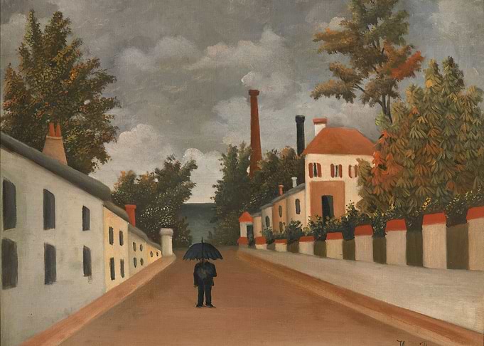 Man with Umbrella on a Rainy Street
