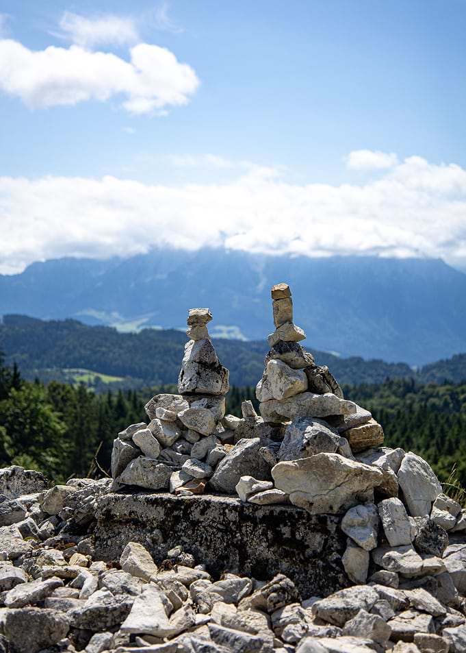 Stone Cairns on Mountain Landscape