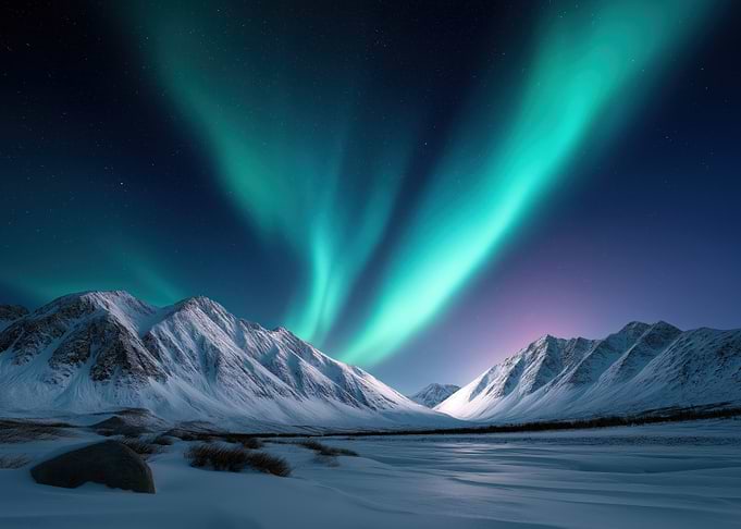 Aurora Borealis over Snowy Mountains