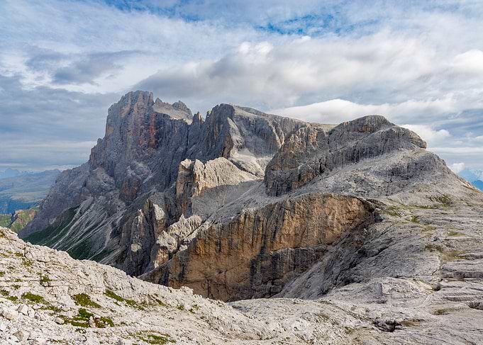 Majestic Mountain Peaks Under Cloudy Sky - Cima Rosetta