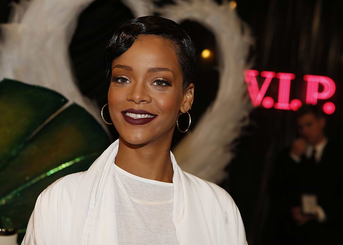 Rihanna Poses in White Outfit