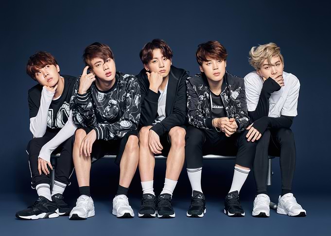 BTS Members Posing in Athletic Wear