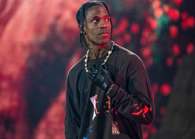 Travis Scott performing on stage