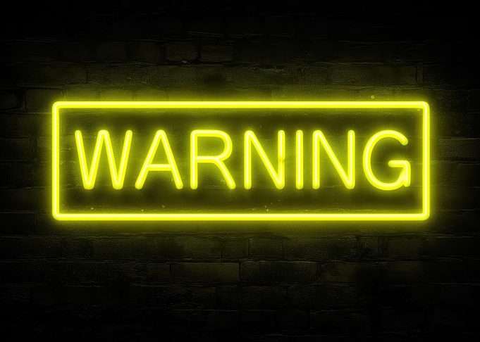 Yellow Neon Warning Sign