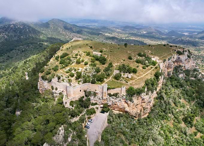 Ancient Castle Ruins on a Cliffside