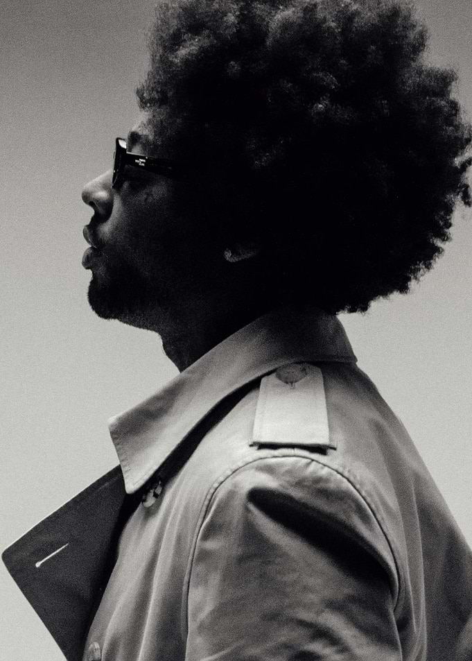 brent faiyaz with Afro and Trench Coat