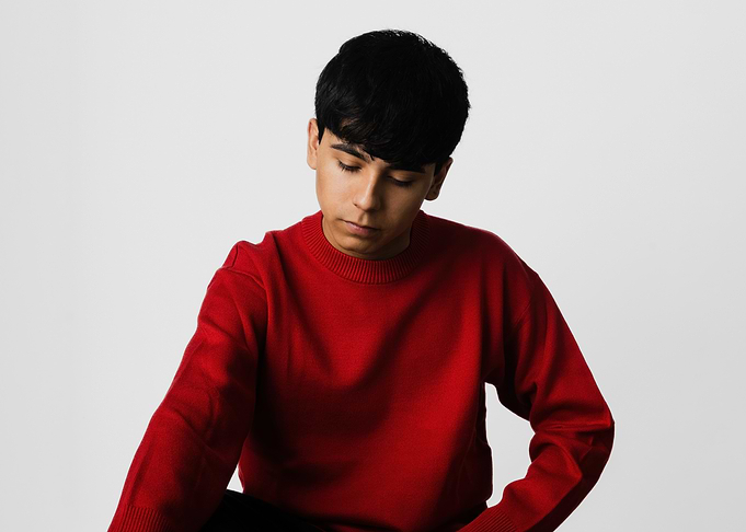 ivan cornejo in red sweater