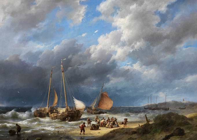 Fishing boats on a stormy beach