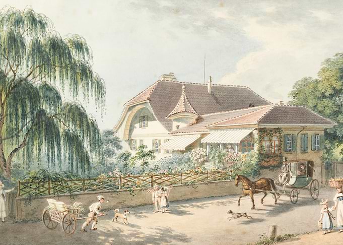 Horse-drawn carriage outside a house