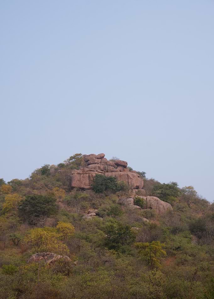Granite Crown Over Wild Deccan Hills at Dusk
