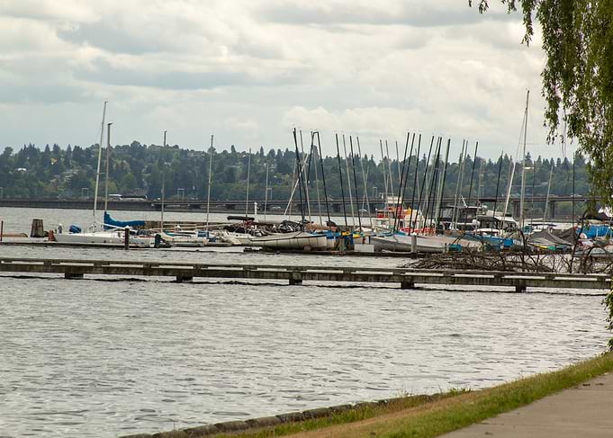Sailboats docked on a cloudy day
