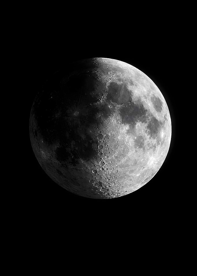Half-lit Moon in Black Space