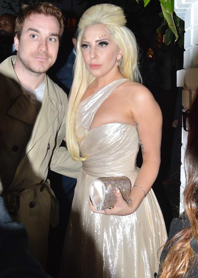 Lady Gaga and companion