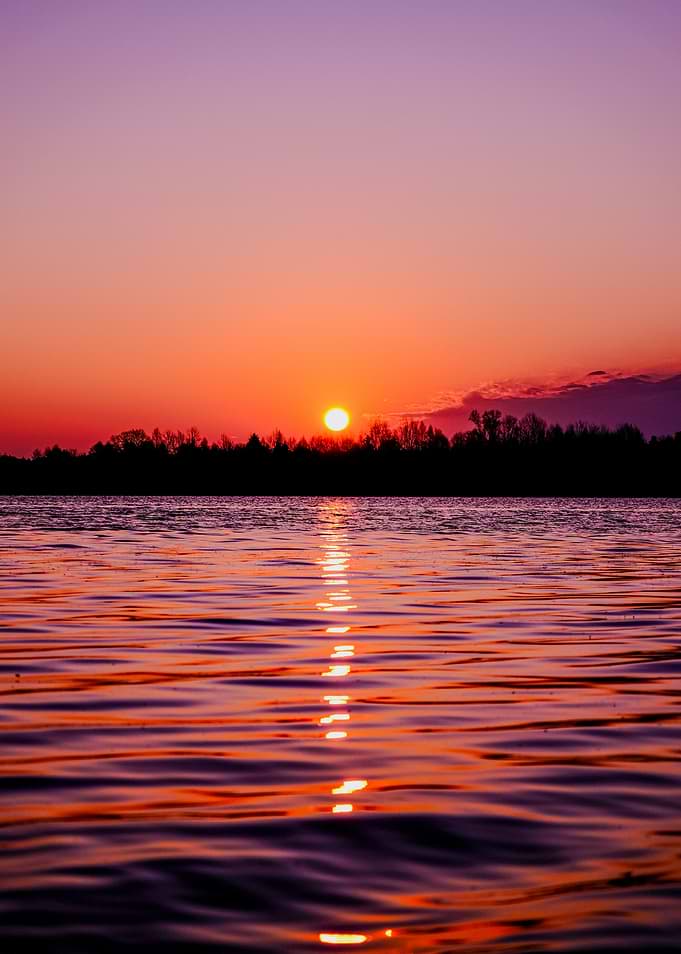 Sunset over a calm lake