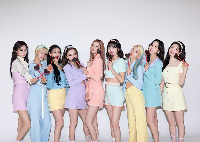 twice Posing with Heart Props