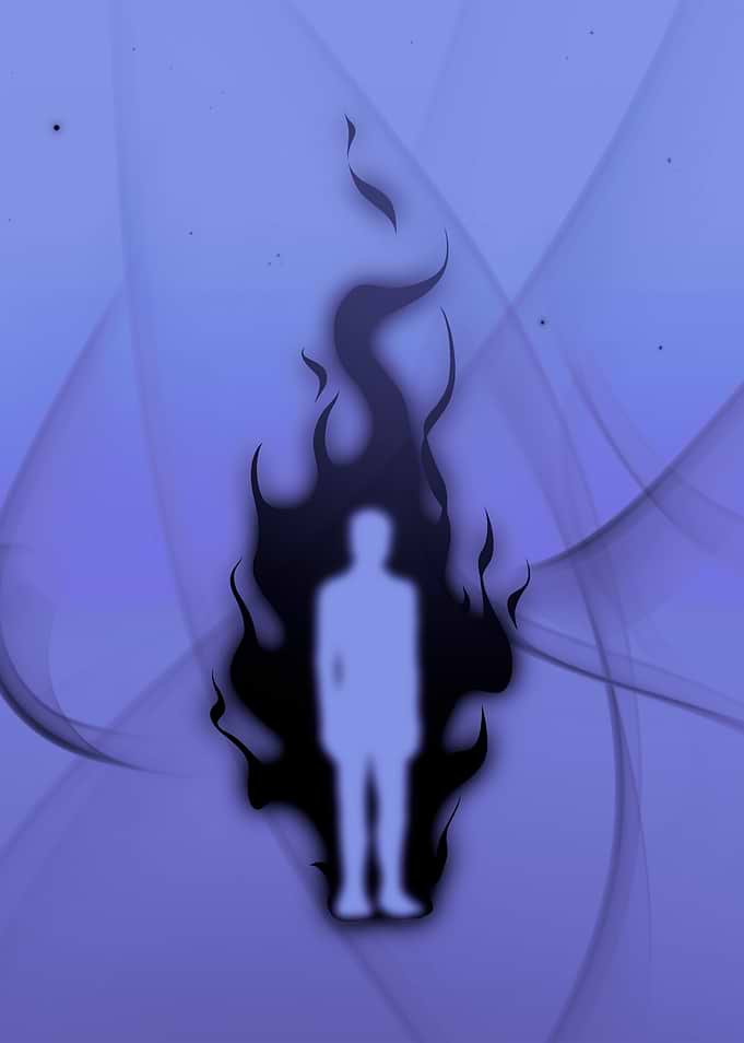 Silhouette of a person engulfed in dark flames