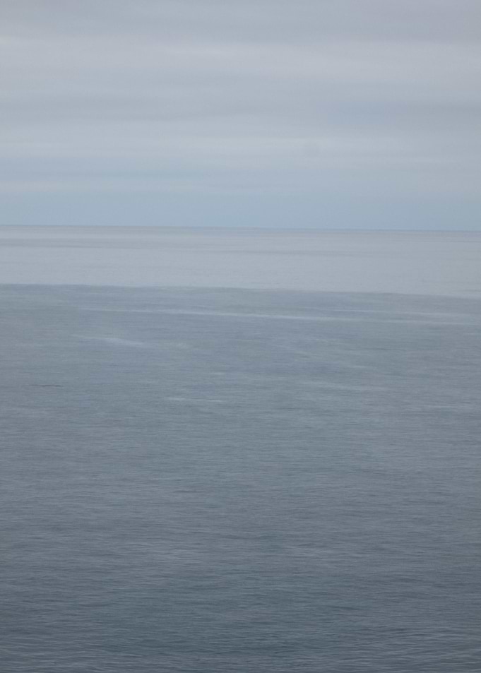 Calm Ocean and Cloudy Sky