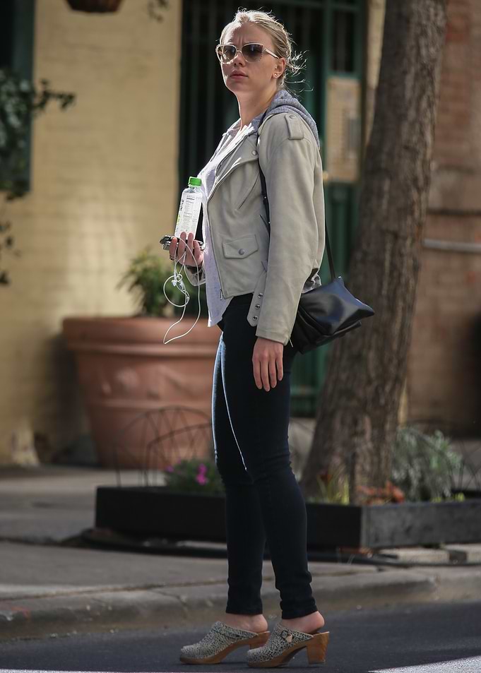 Scarlett Johansson walking with water bottle