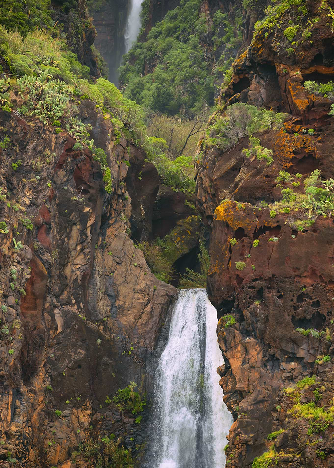 Majestic Waterfall in a Lush Canyon, Portugal island