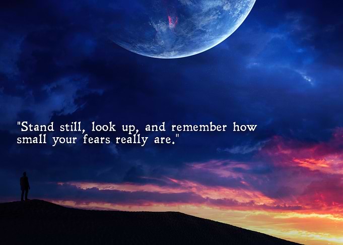Inspirational quote over a cosmic landscape