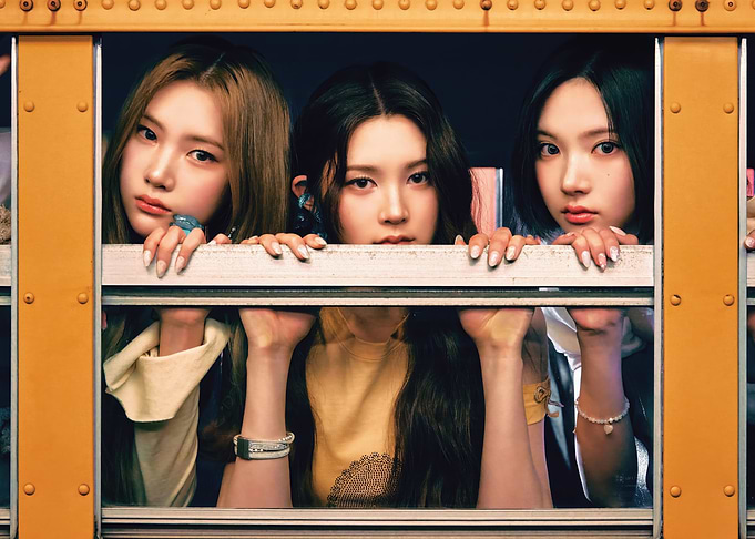 babymonster Peeking Through Bus Window