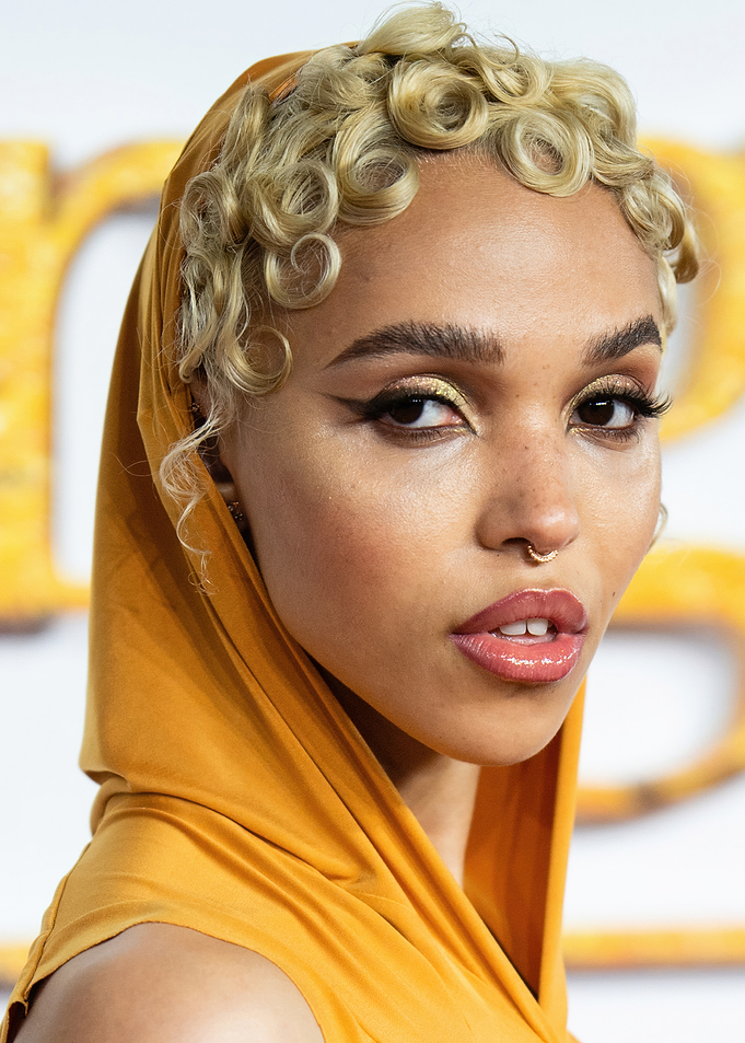 FKA Twigs in Yellow Hooded Dress