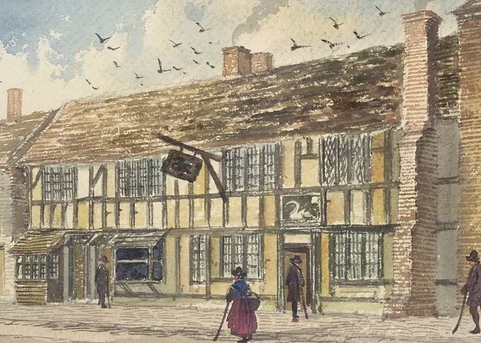 Historic Inn with Swan Sign